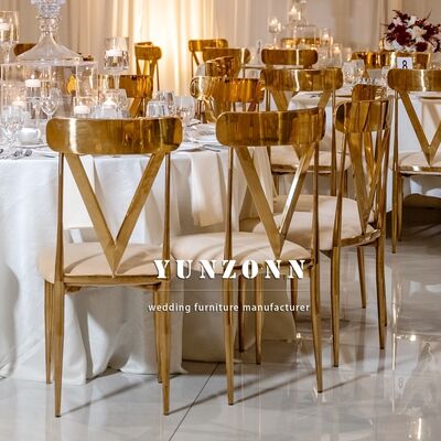 Good price New Design White Cushion Wedding Hotel Chair with Gold Stainless Steel V-Shaped Back online